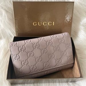 Gucci monogram leather wallet